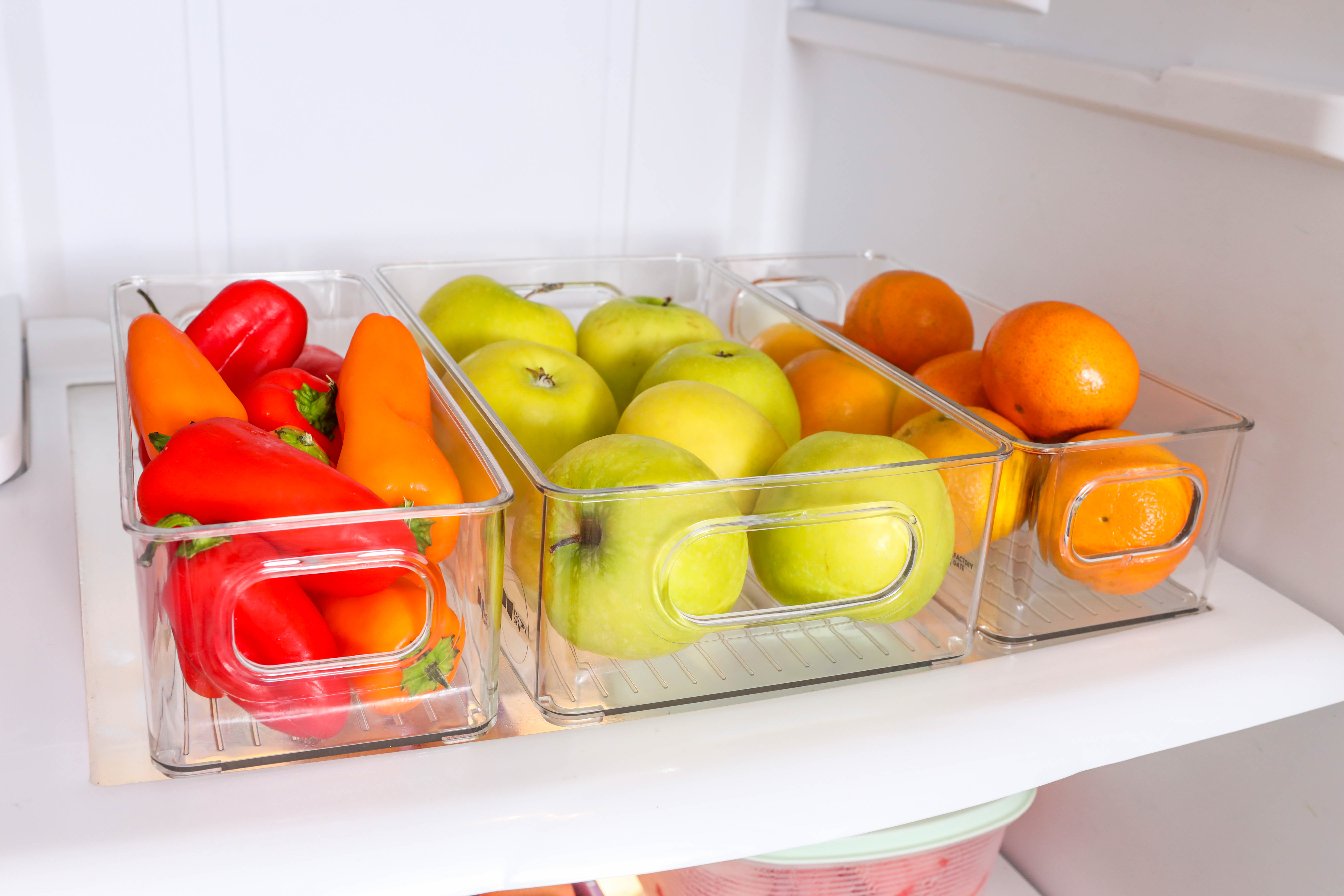 Colorful produce neatly arranged in Factory Gate clear storage bins